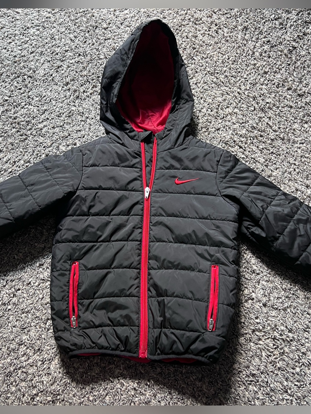 Nike Kids Black Puffer Jacket with Red Trim and Hood